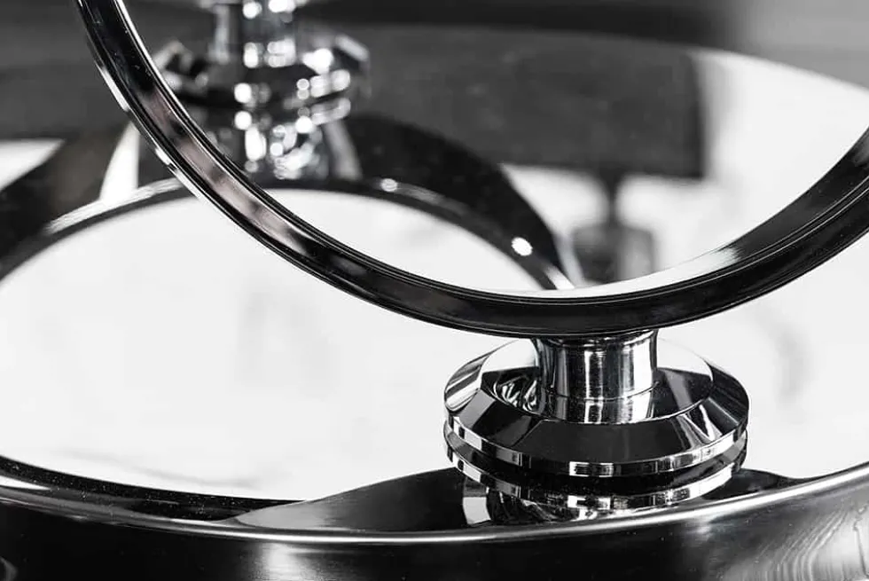 Design Couchtisch DANCING RINGS weiß rund drehbar Marmor Keramik Chrome Gestell