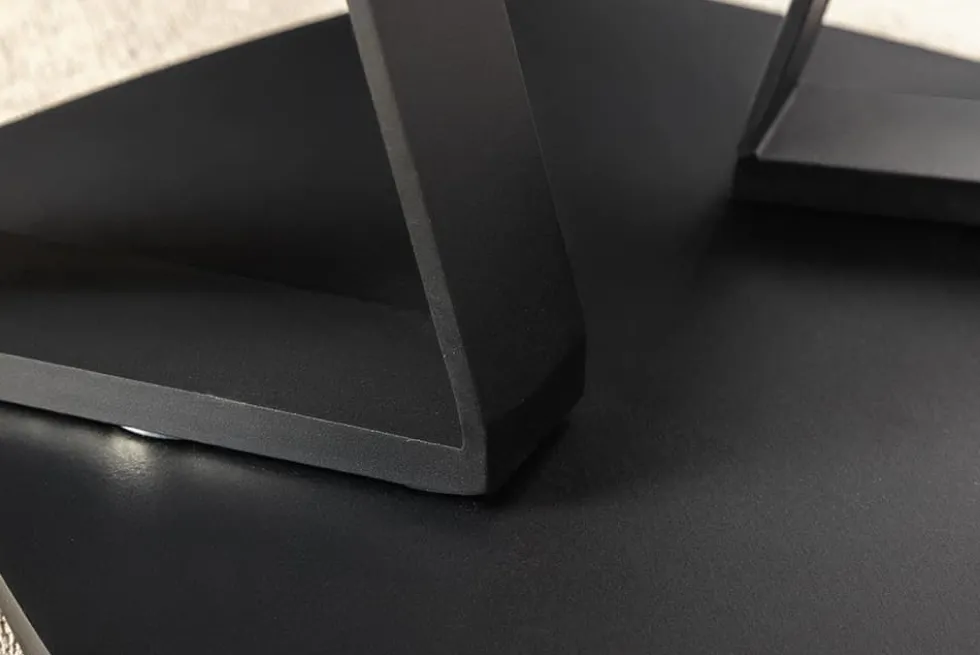 Design Couchtisch MOVEMENT rost Pentagon drehbar Travertin Keramik schwarz Metall