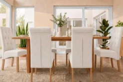 Design Stuhl CASA beige Strukturstoff Massivholzbeine mit Zierknöpfen und Nackenrolle