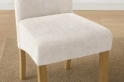 Design Stuhl CASA beige Strukturstoff Massivholzbeine mit Zierknöpfen und Nackenrolle