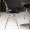 Design Stuhl SCANDINAVIA MEISTERSTÜCK schwarz goldene Beine