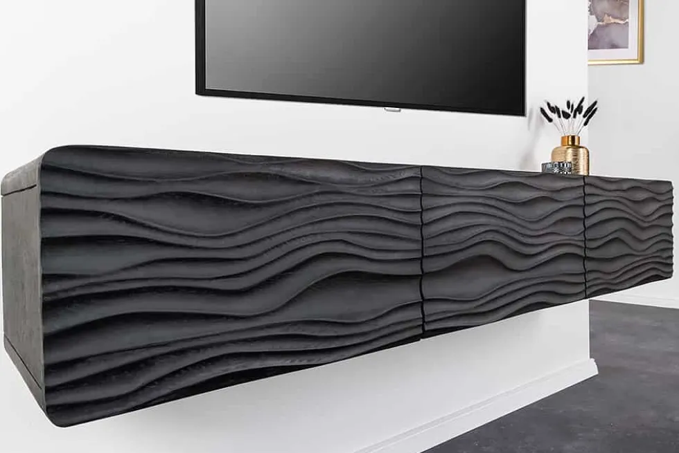 Design TV-Board WAVE 160cm schwarz Mangoholz mit 3D Schnitzereien hängend