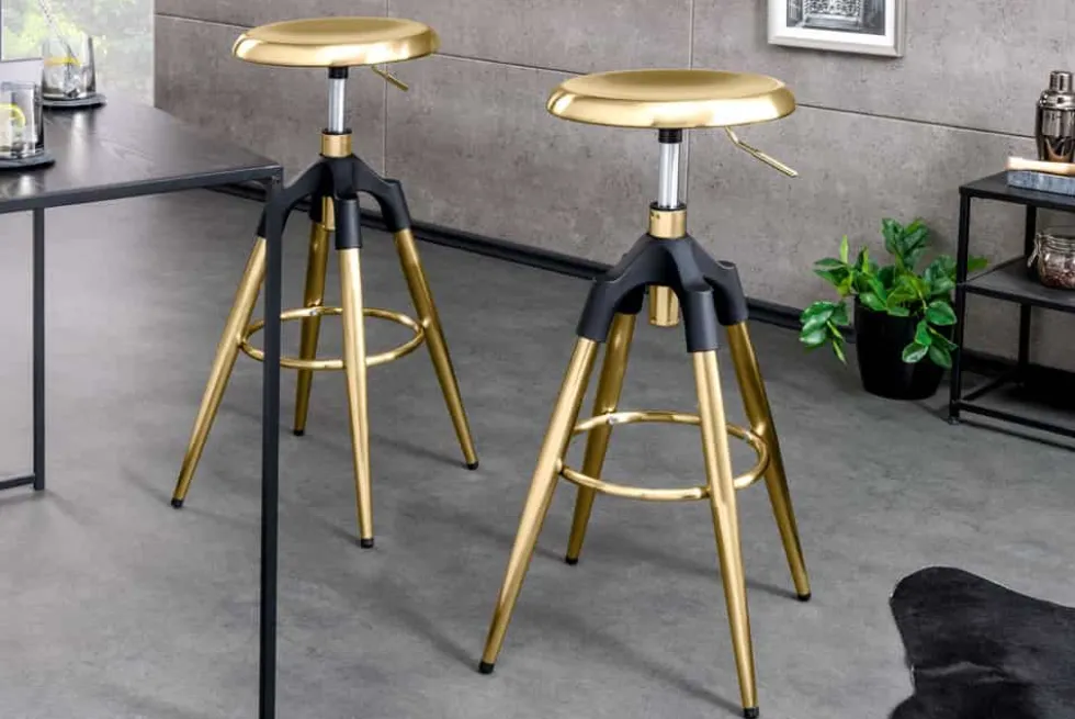 Höhenverstellbarer Barhocker INDUSTRIAL gold schwarz Metall rund drehbar Industrial Design