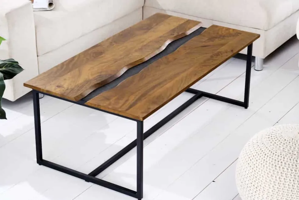 Massiver Couchtisch AMAZONAS 110cm Mangoholz Metall schwarz Baumkante Honey Finish