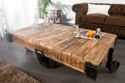Massiver Design Couchtisch RAILWAY 110cm Mangoholz mit 4 Rädern
