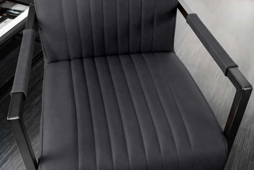 Moderner Freischwinger Stuhl BIG ASTON Echtleder schwarz Taschenfederkern Metall