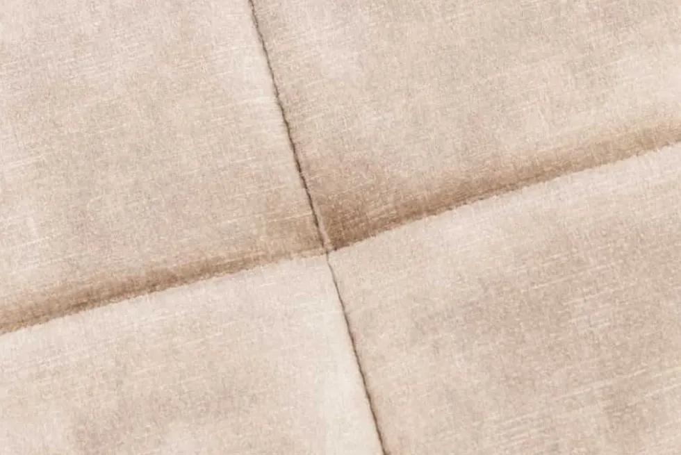 Moderner Hocker SCANDINAVIA champagner beige Samt schwarze Metallbeine Fußhocker