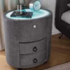Nachttisch SIGNUM 55cm oval grau Vogue Seiden Samtstoff inkl. Beleuchtung Schubladen