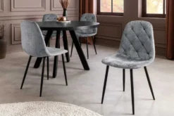 Stilvoller Stuhl GLAMM grau Chenille Cremona mit Rauten-Steppung schwarze Metallbeine